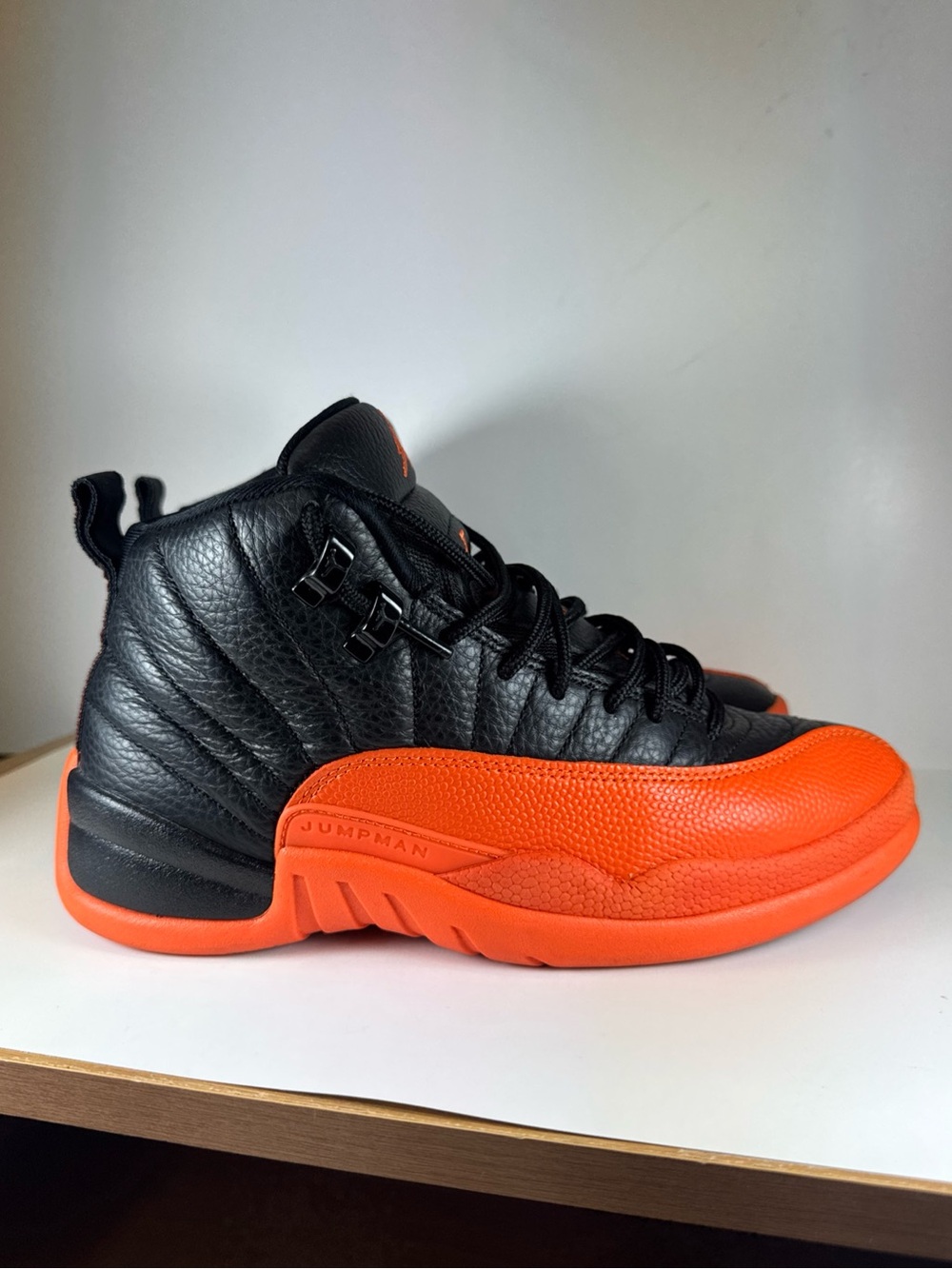 Air Jordan 12 Retro Black Brilliant Orange Size 8.5 Women’s Sneakers